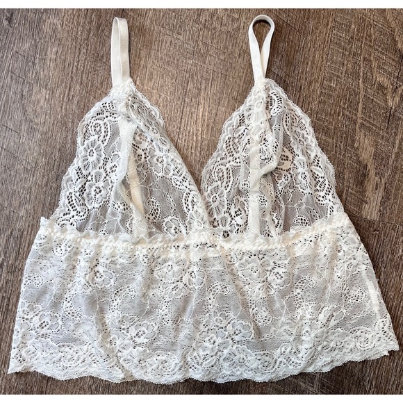 Tops - White Lace Peplum top adjustable straps size M